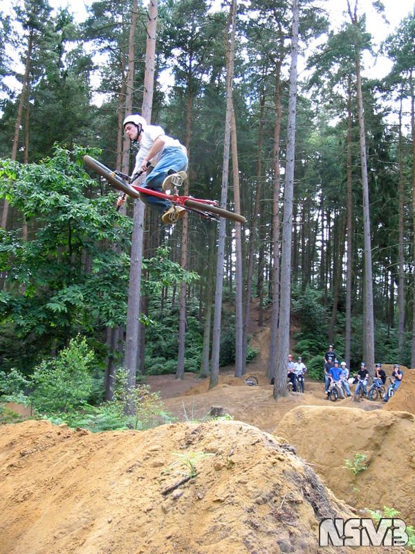 mountain bikers destroy rainforest illegally to build their playground